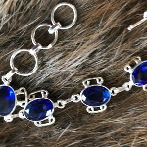 7 - 8 inch sterling silver bracelet-5 colbalt blue stones.  adjustable  nwot